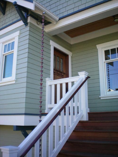 Craftsman entry with purple rain chain by Ventana Construction LLC