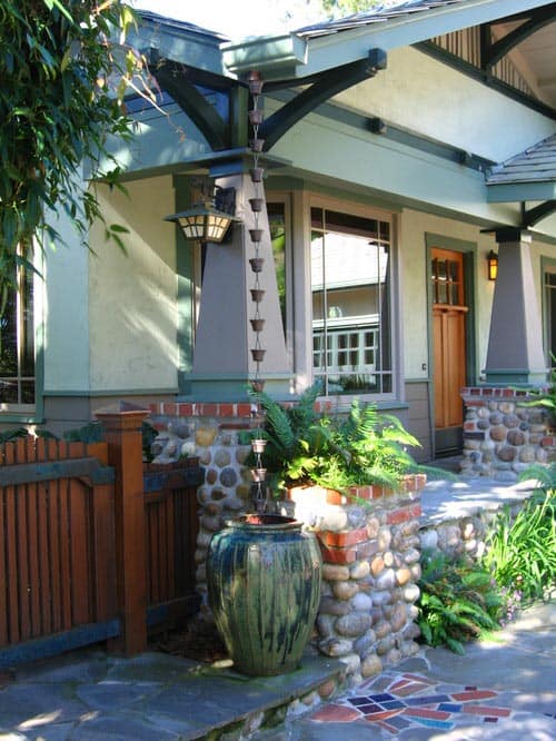 Rain chain on a Craftsman Exterior by Laura Livingston Landscapes