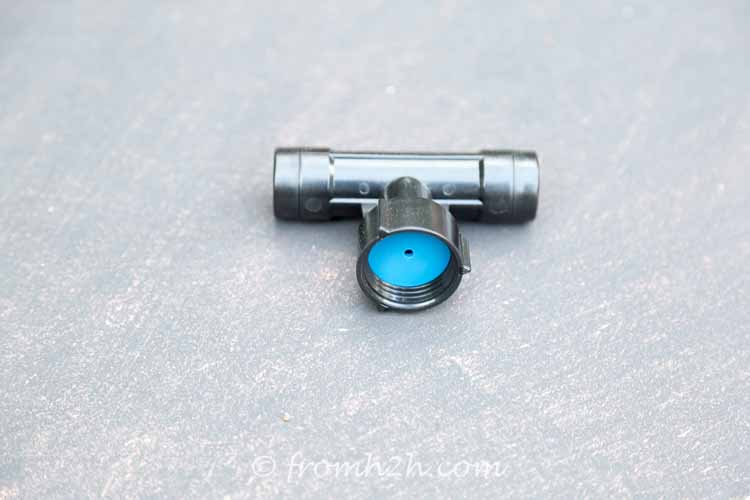 A feeder splitter connection for a soaker hose system