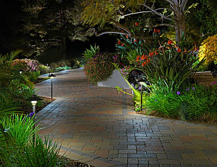 Stagger pathway lighting so it isn't in a straight line, Photo by System Pavers | 8 Landscape Lighting Effects and How To Use Them