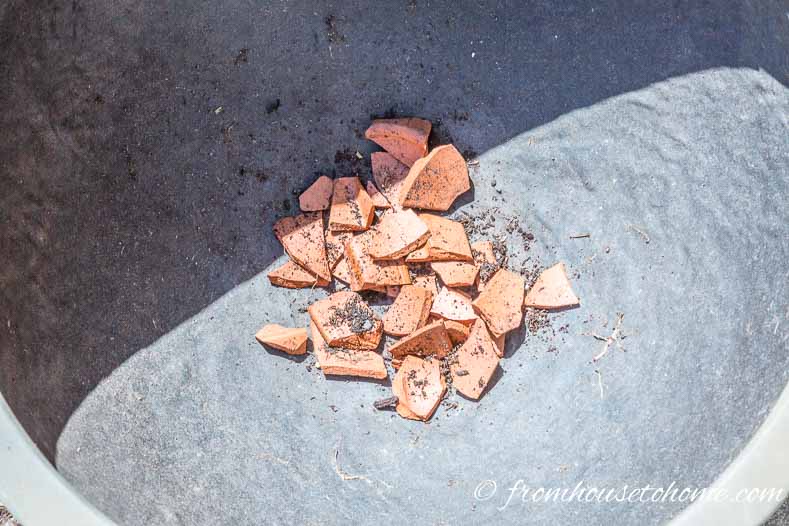 Add stones or broken ceramic pots to help with drainage | The No-Fail Method for Planting Beautiful Containers | I use this formula to plant all of my outdoor containers. It never fails to produce beautiful planters that are easy to create.