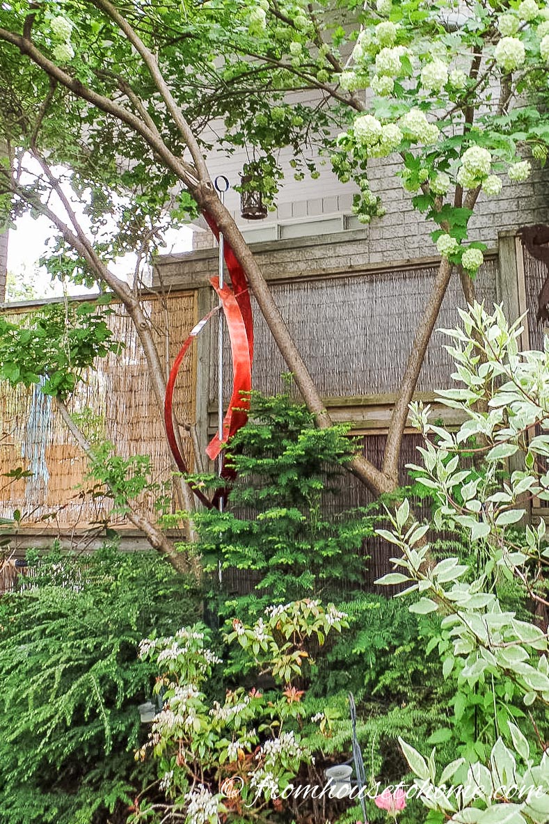 Modern red statue in the garden