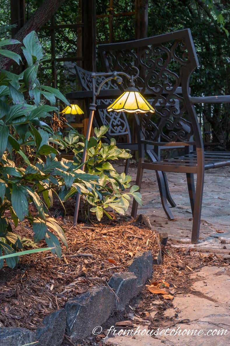 Installing path lights between plants makes them look more natural
