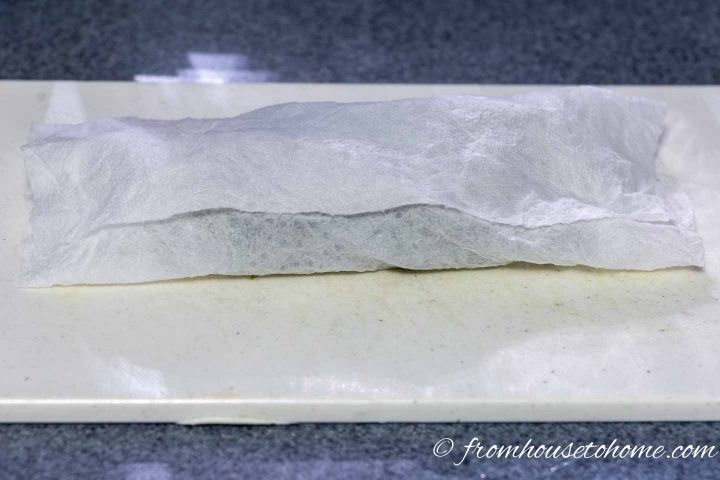 Fresh thyme wrapped in a damp paper towel