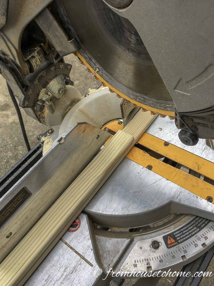 Miter saw cutting thin boards for the decorative panel frame