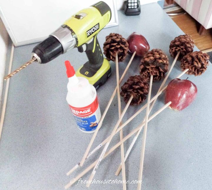 Supplies for making pine cone and faux apple picks