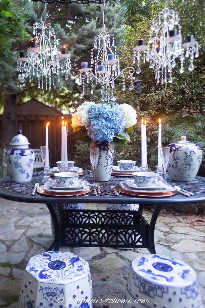 Blue and white ginger jars on an outdoor tablescape
