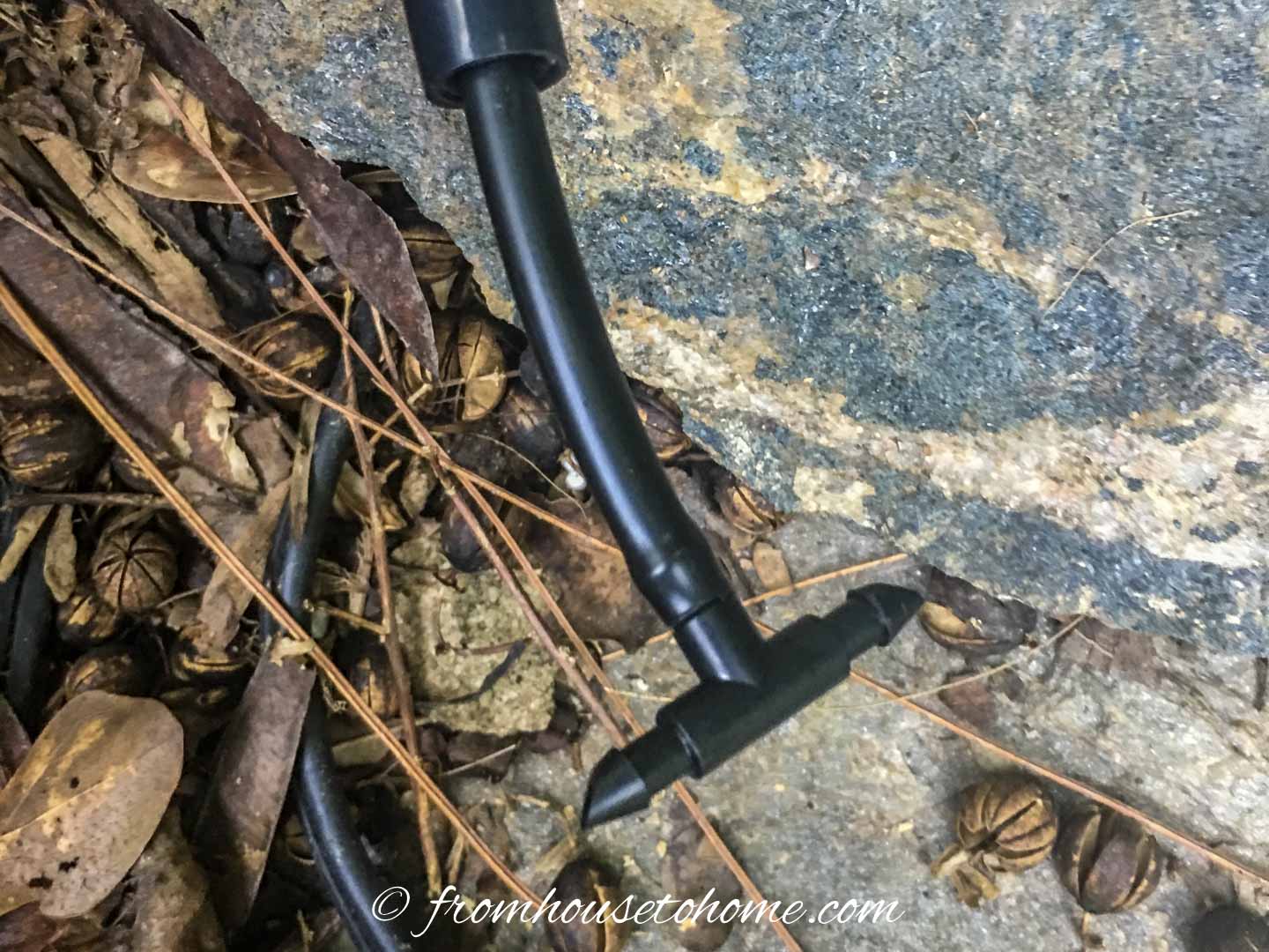 The tee connector after it has been attached to the hose
