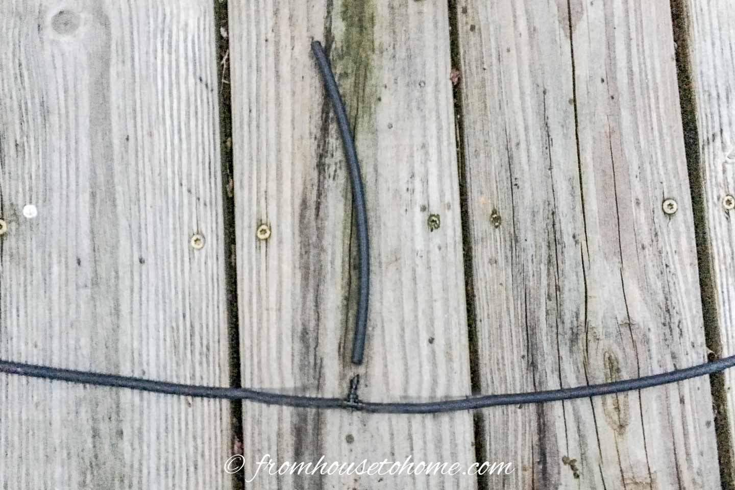 A watering system hose to a planter