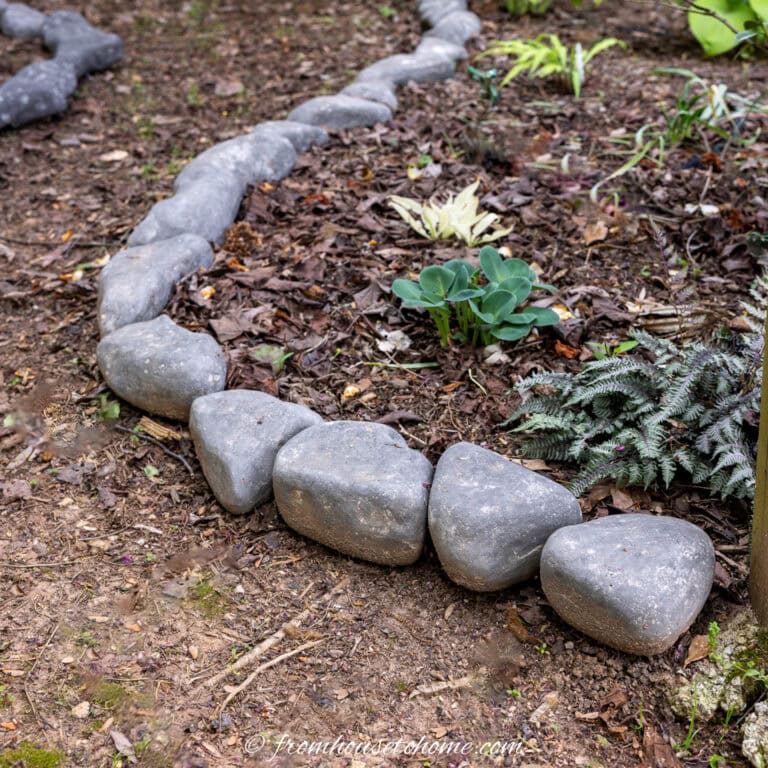 Faux rocks used as garden edging
