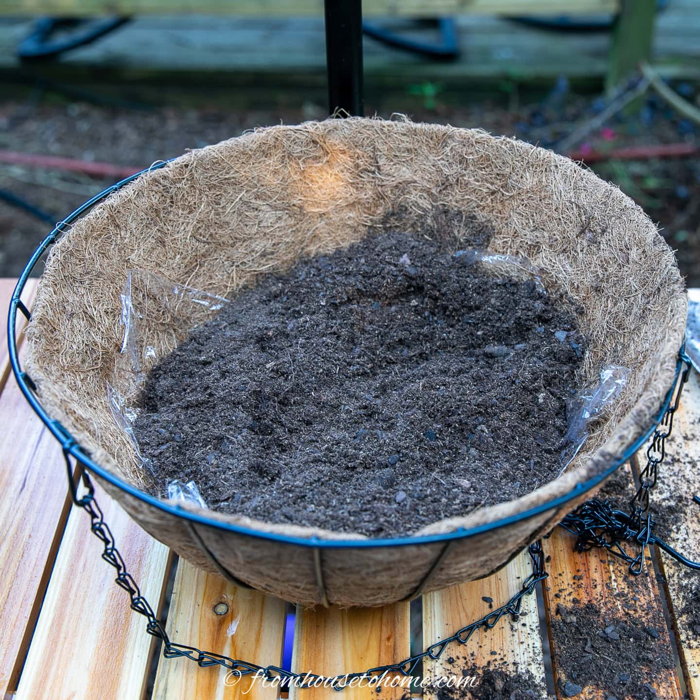 Potting soil mix in a hanging basket