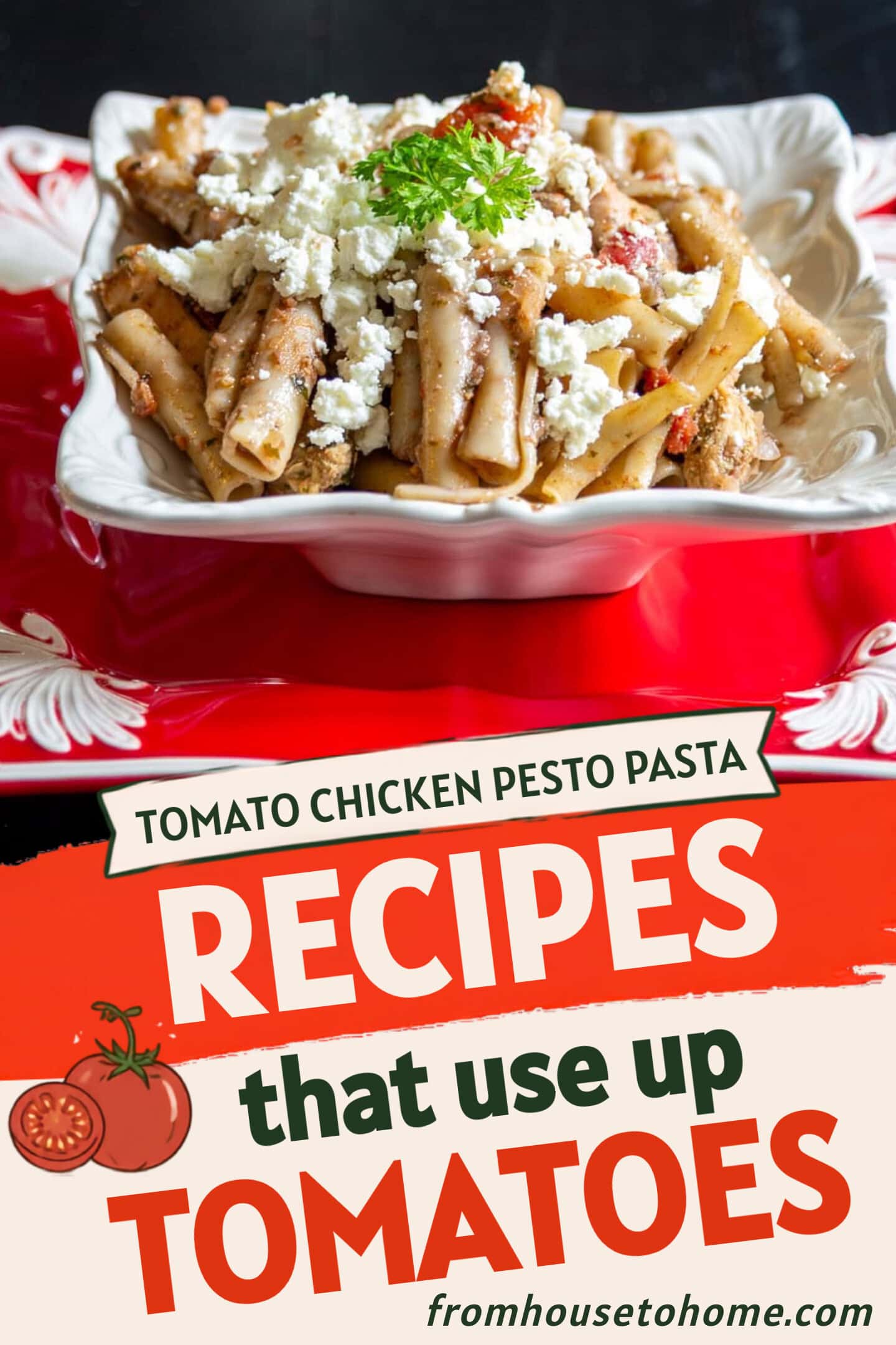 A square white bowl filled with pasta topped with crumbled cheese and herbs, placed on a decorative red and white plate with utensils on a dark surface.