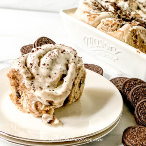 Oreo cinnamon roll with cream cheese filling on a plate