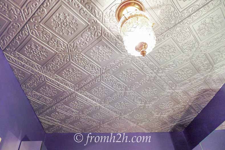 Ceiling tiles painted to look like tin