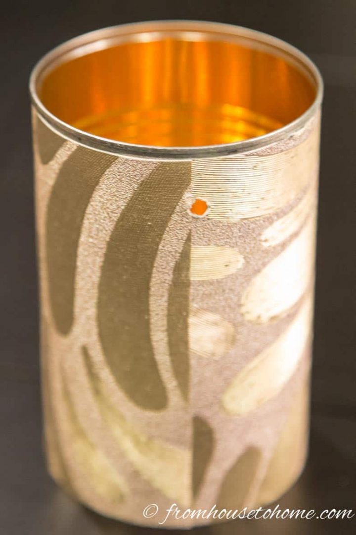Wallpapered Aluminum Can With Hole Drilled just below the rim