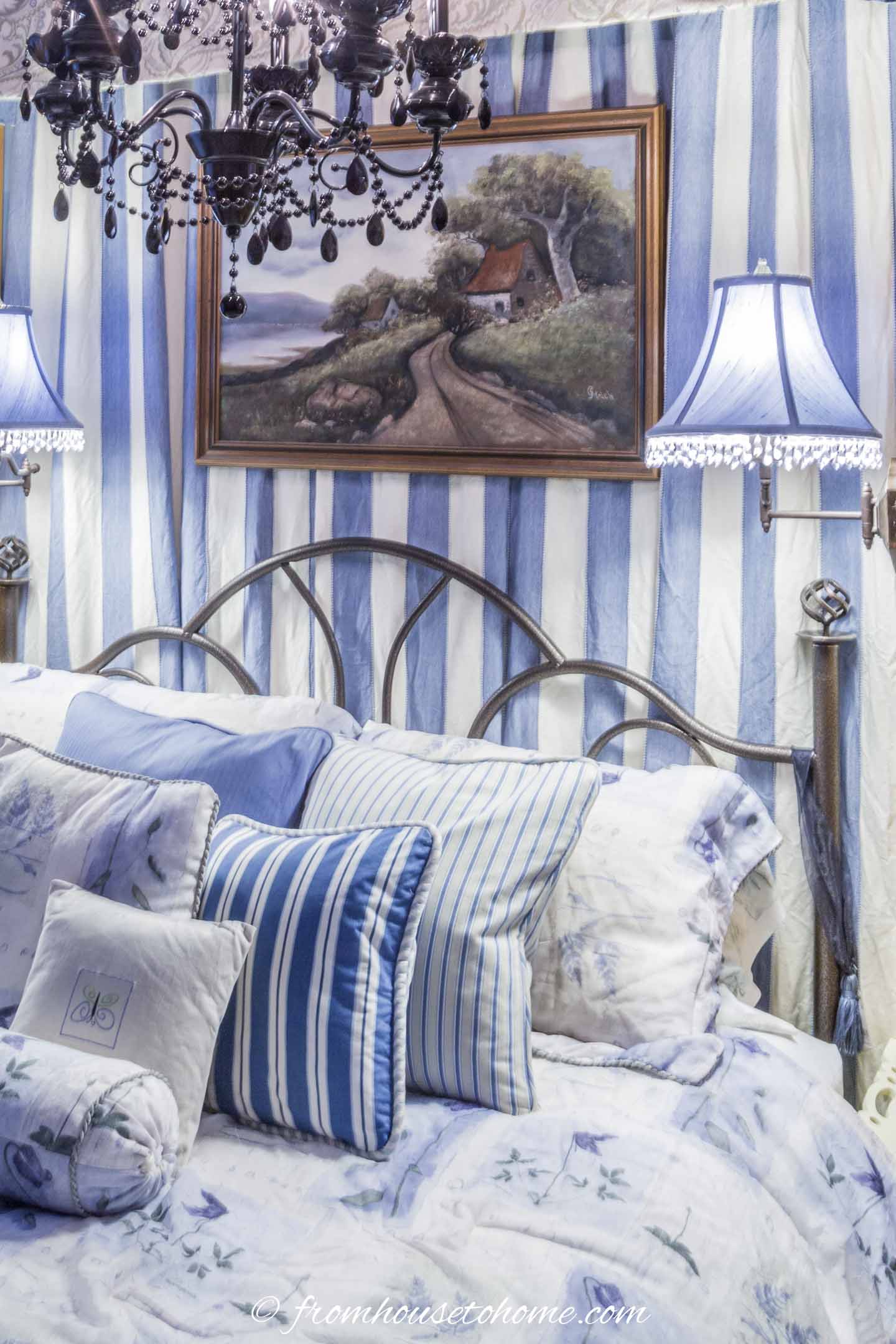 Stripes in the curtain fabric, bed skirt and pillows