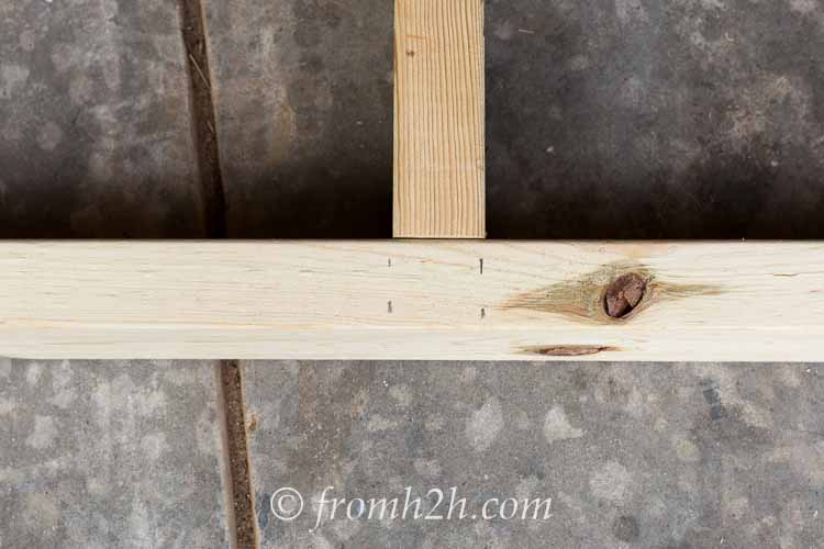 The 21" support should line up between the lines | How To Build a Fold Down Workbench in a Day