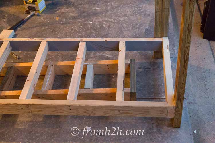 Attach bottom shelf to legs using 3 screws | How To Build a Fold Down Workbench in a Day