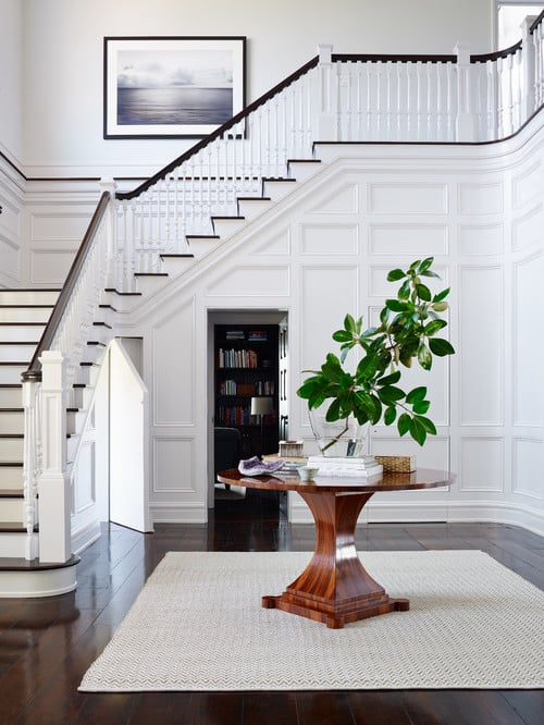Panel mouldings add interest to what could otherwise be a plain entryway - Victorian Entry by Jacksonville Interior Designers & Decorators Andrew Howard Interior Design | 10 Easy Ways To Make Your House Look More Expensive