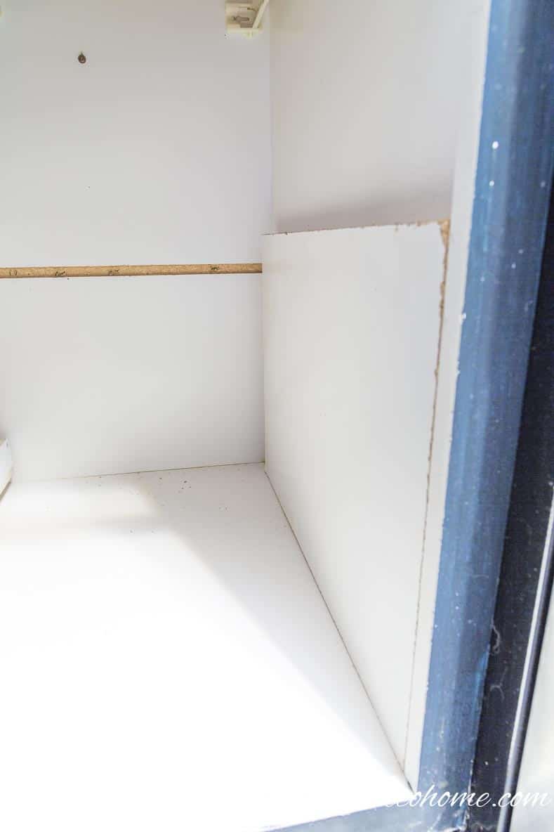 If the side of your cabinet is not flush with the door edge, install a piece of board to bring it out