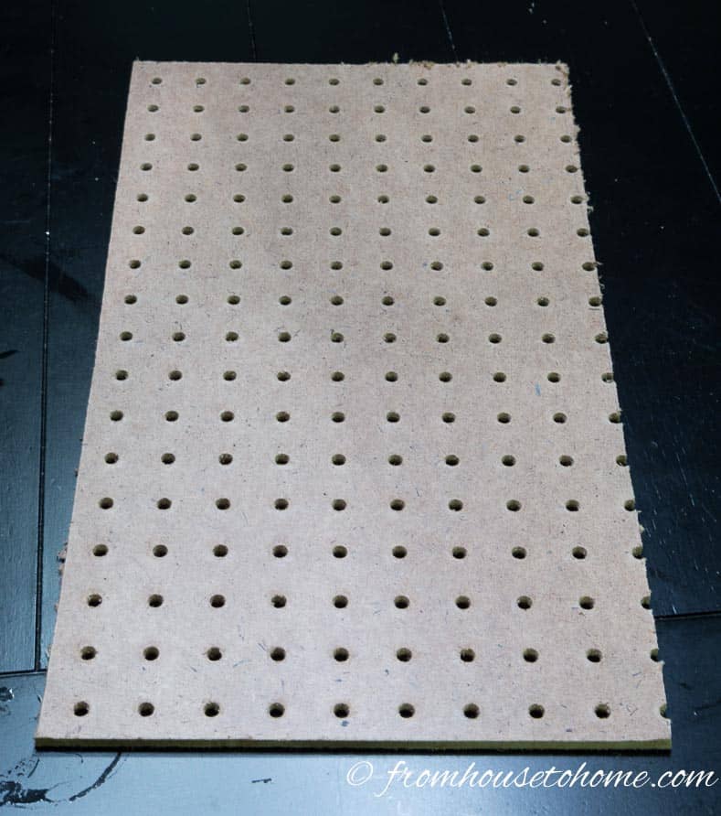 Cut pegboard to fit the back of the door