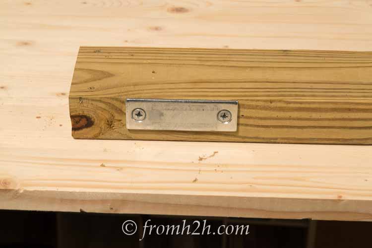 Install the strike for the magnet on the side of the leg | How To Build a Fold Down Workbench in a Day