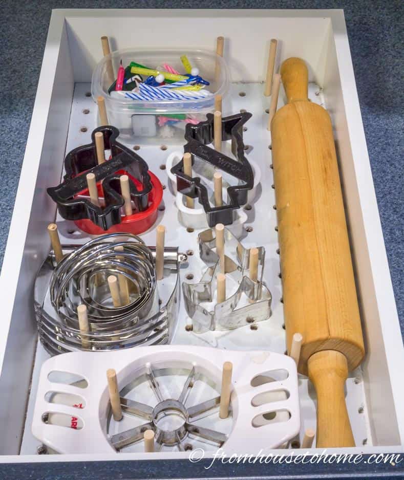 Kitchen supplies in the custom pegboard DIY drawer organizer