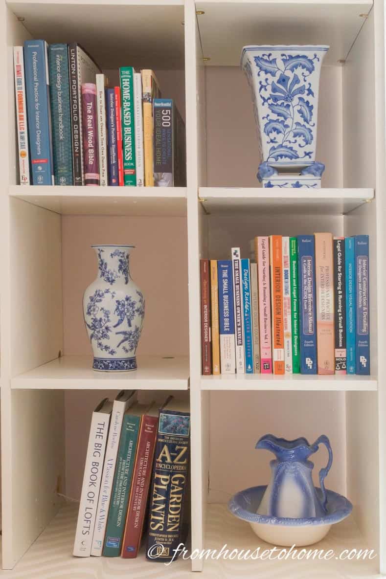 The DI bonus room bookshelves with books and accessories