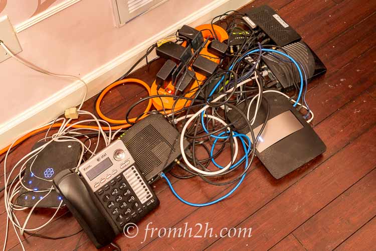 The mess of boxes and cords | How To Hide Your Router and Modem