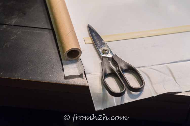 The interfacing, roller and scissors on a table
