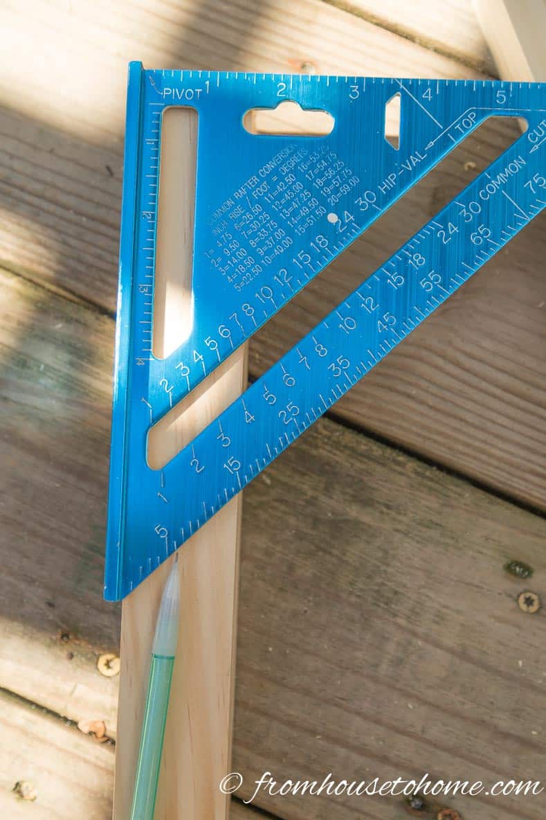 Use a construction square or protractor to measure a 15 degree angle | DIY Fabric Storage Ladder