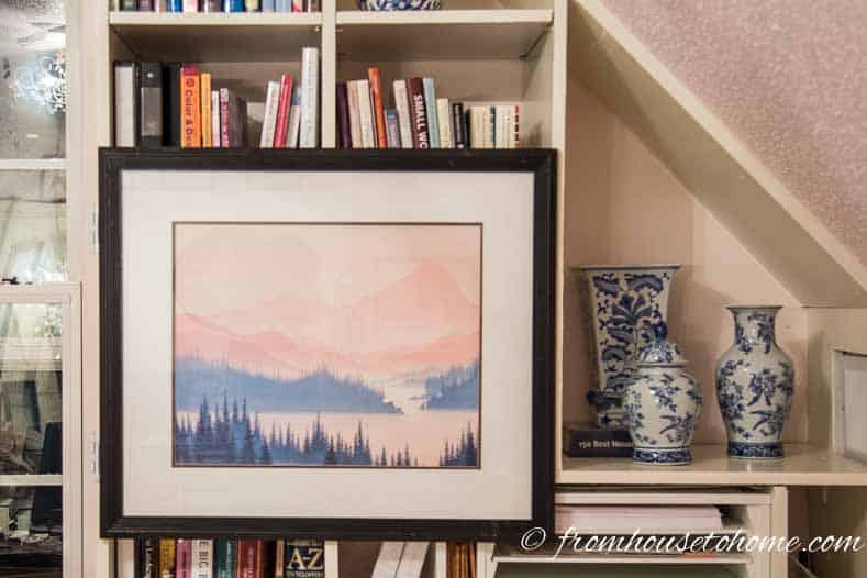 How To Hang Art On a Bookcase And Still Have Access To The Books | How To Hang Art On A Bookcase (And Still Have Easy Access To The Books)