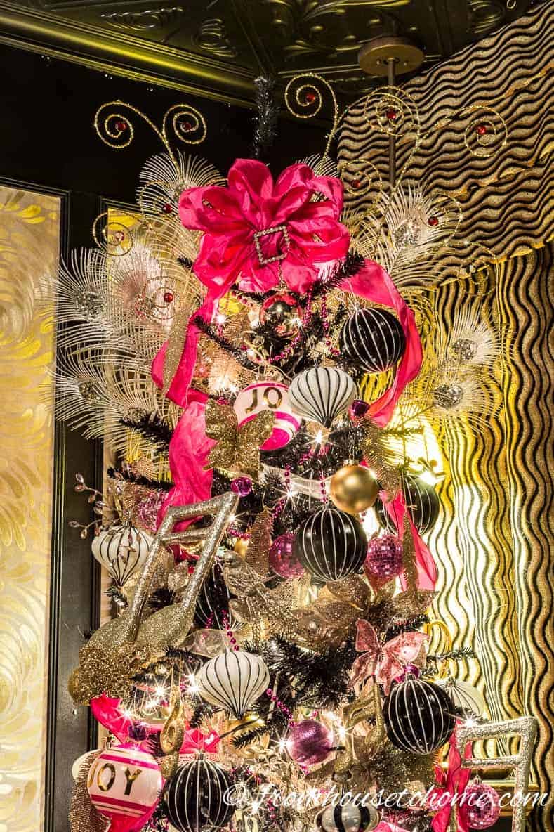 The top of the Kate Spade inspired Christmas tree | Looking for some glam gold Christmas tree ideas with a splash of pink? Learn how to decorate a Kate Spade inspired Christmas tree with these step-by-step instructions (and sources).
