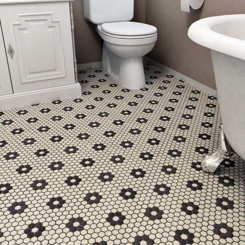 White bathroom floor with black flower pattern