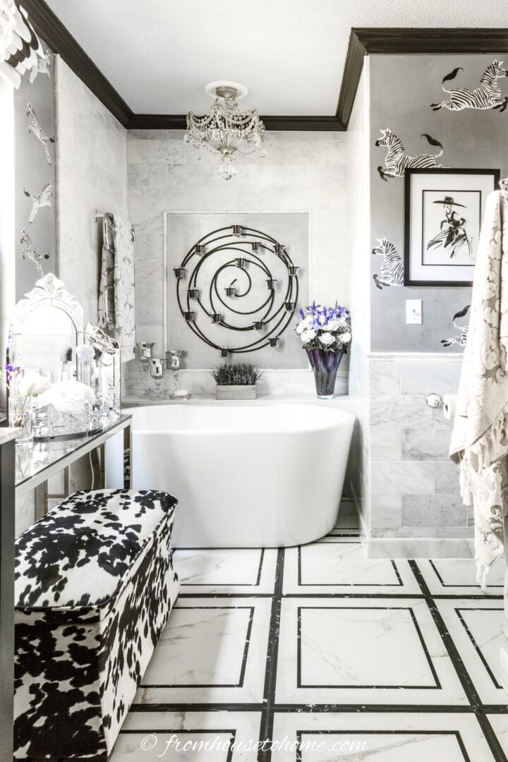 Art deco style bathroom with large white and black floor tiles