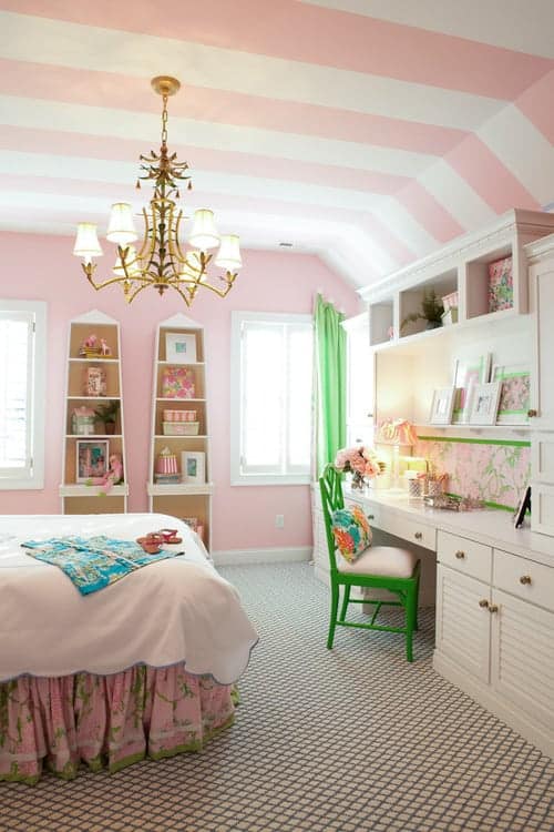 Bedroom with pink and white stripes painted on the ceiling