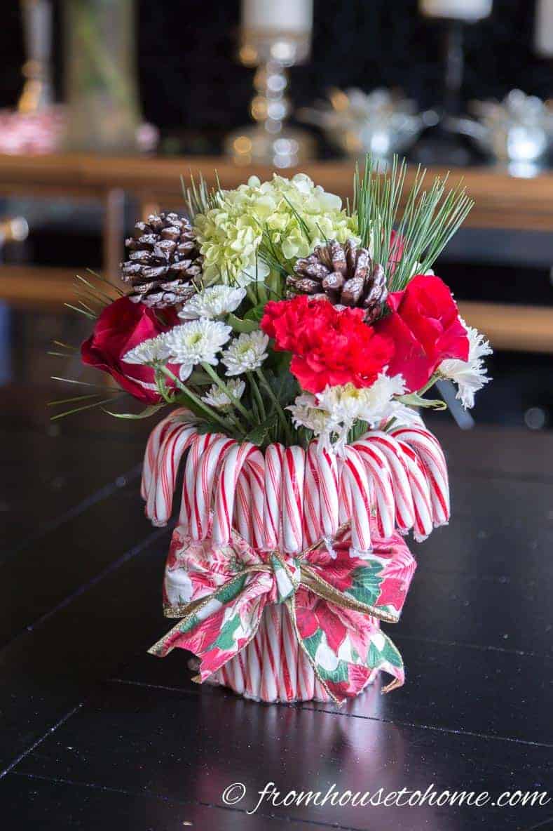 Candy cane Christmas centerpiece filled with flowers