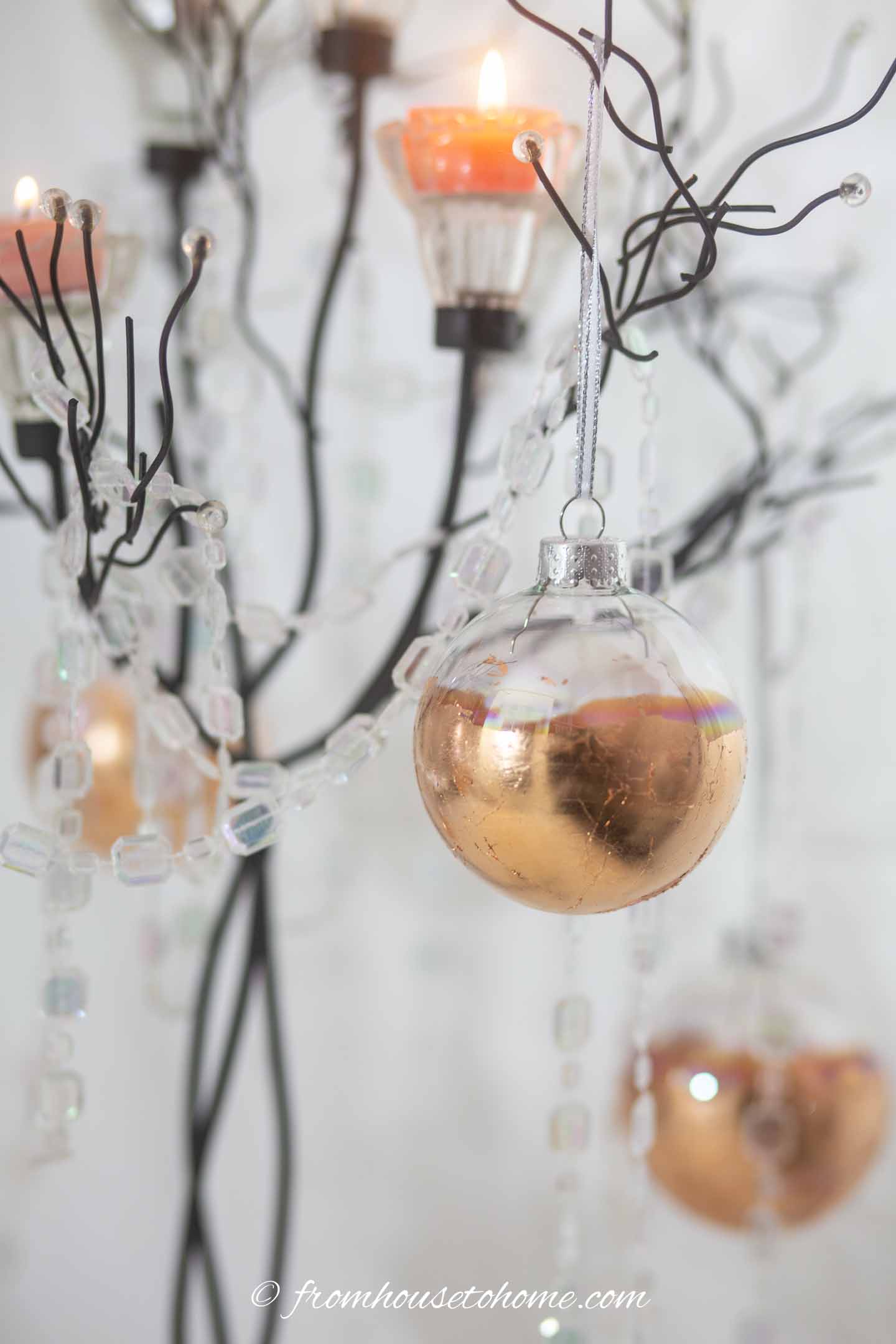 Twig Christmas tree decorated with DIY copper leaf ornaments