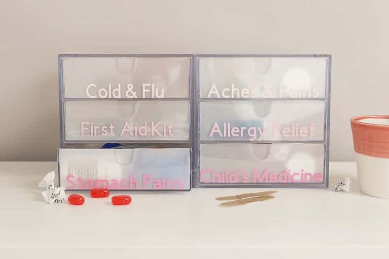 Pretty medicine cabinet organization labels made with a Cricut machine