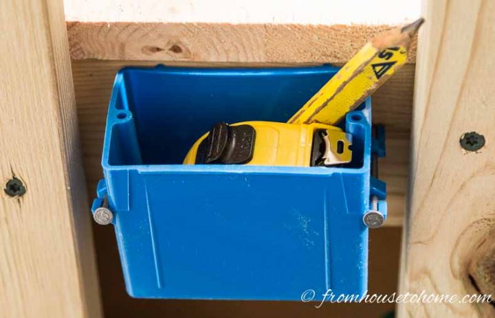 Use electrical boxes as storage for tape measures and pencils