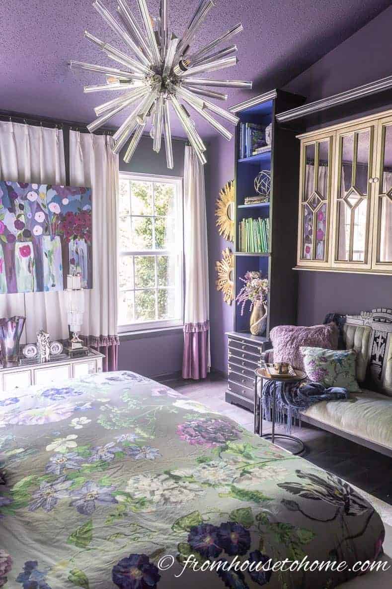 Purple bedroom ideas: Master bedroom sputnik light fixture against purple walls