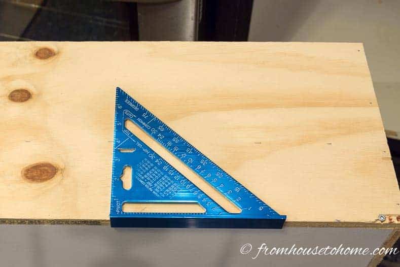 Use a construction square to mark where the slide will be installed