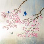 silver wall painted with cherry blossom stencil