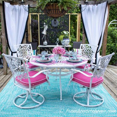 pink and blue out door decor on a deck