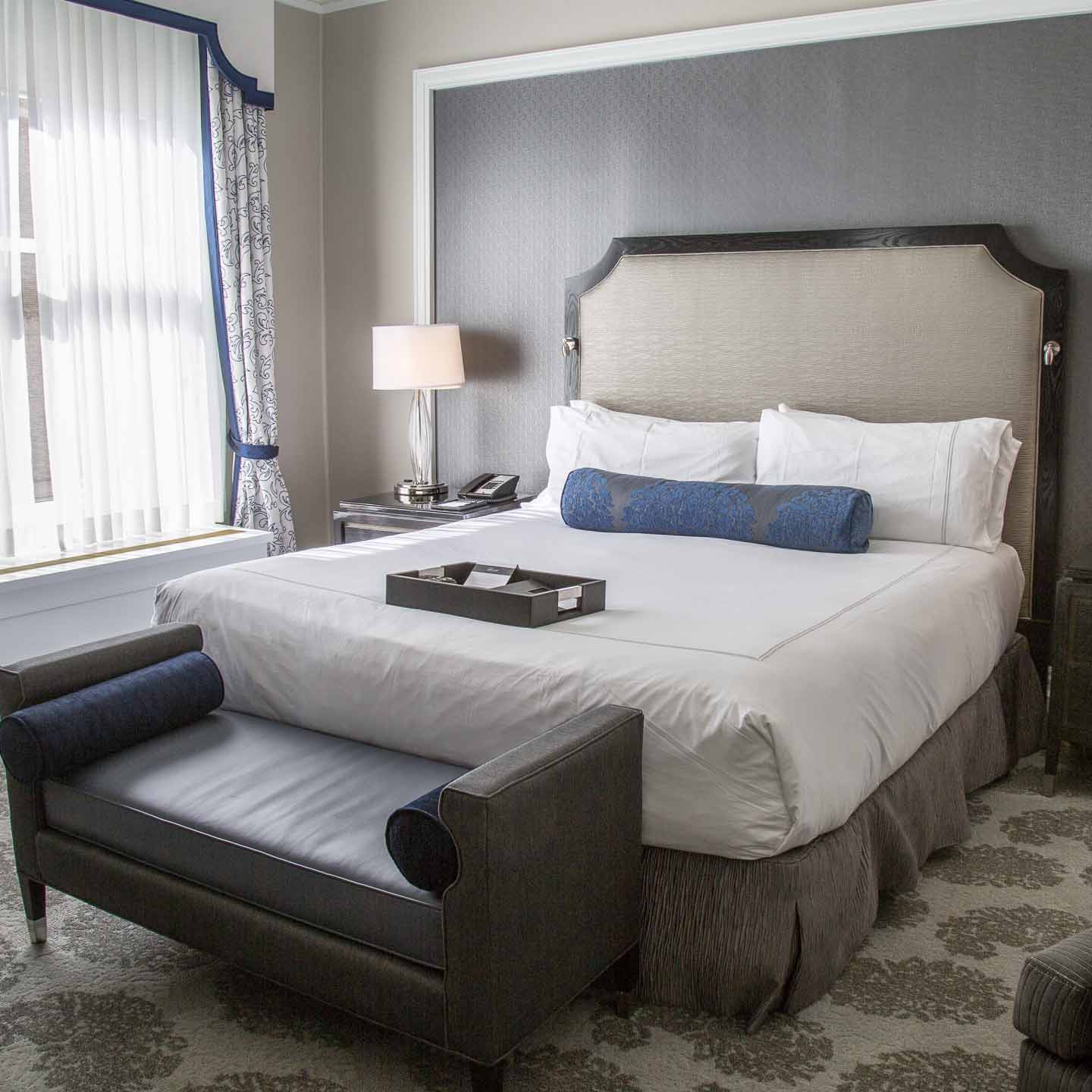 Bed with a bench at the end