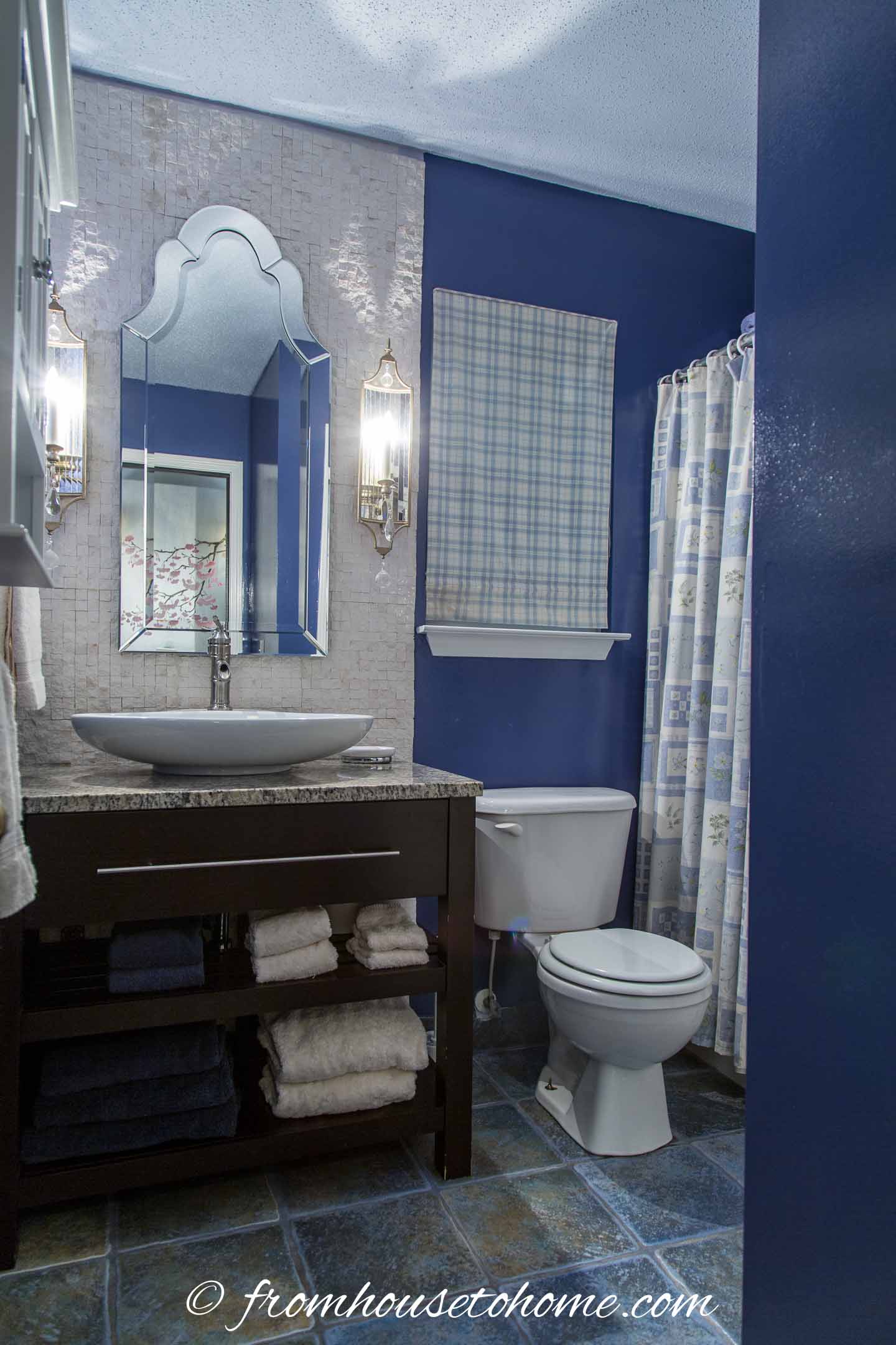 A small blue and white bathroom