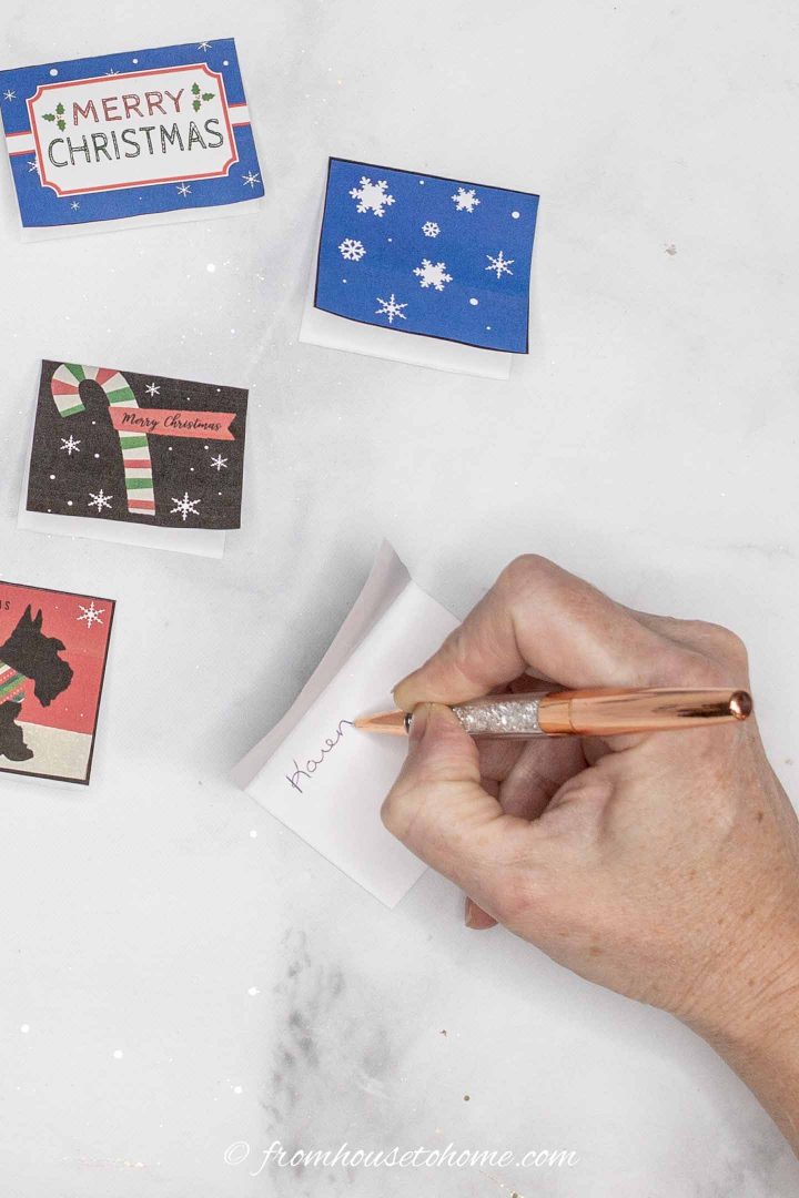 Gift tag being written in