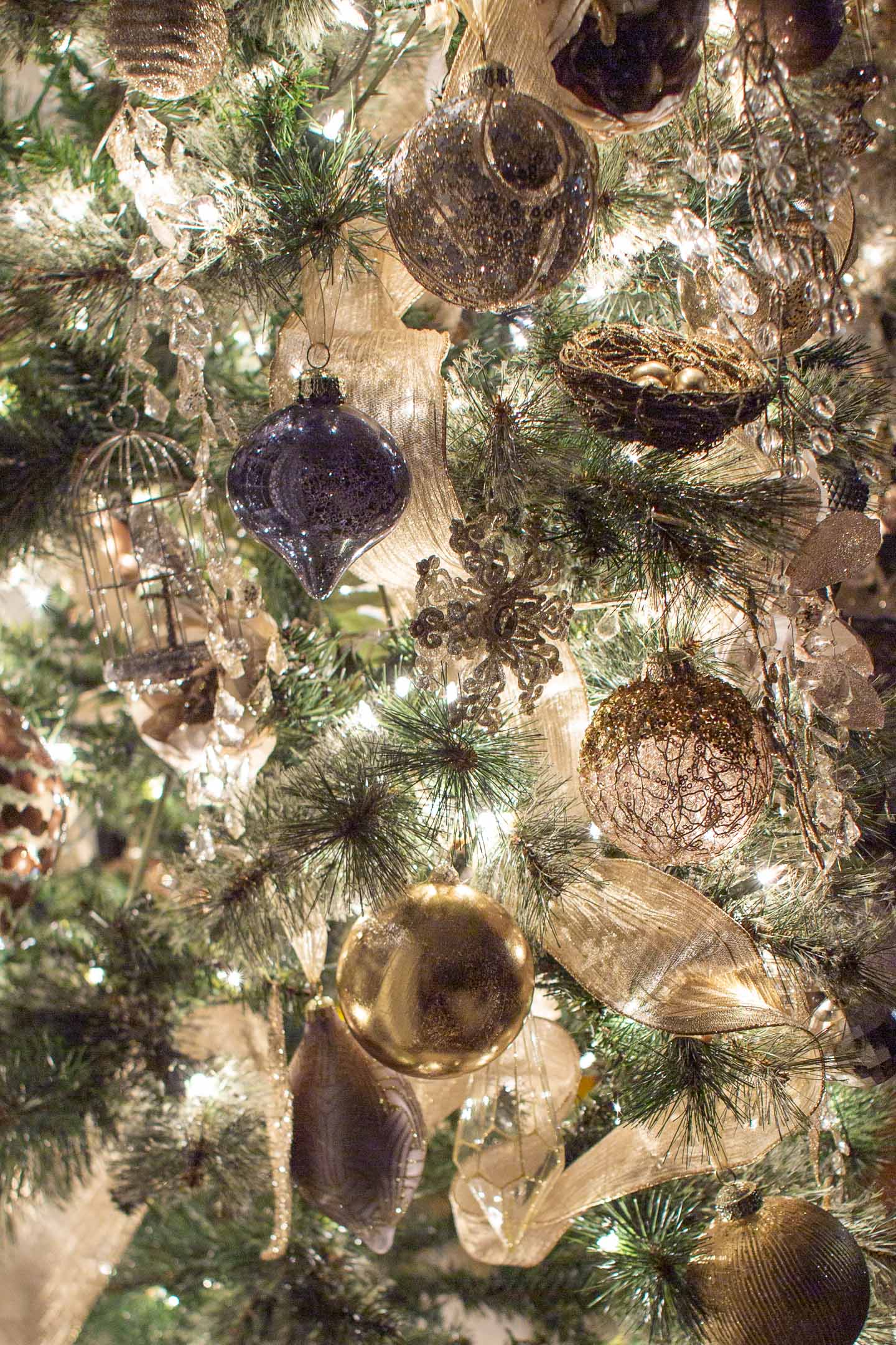 Mixed metals Christmas tree decorations at night
