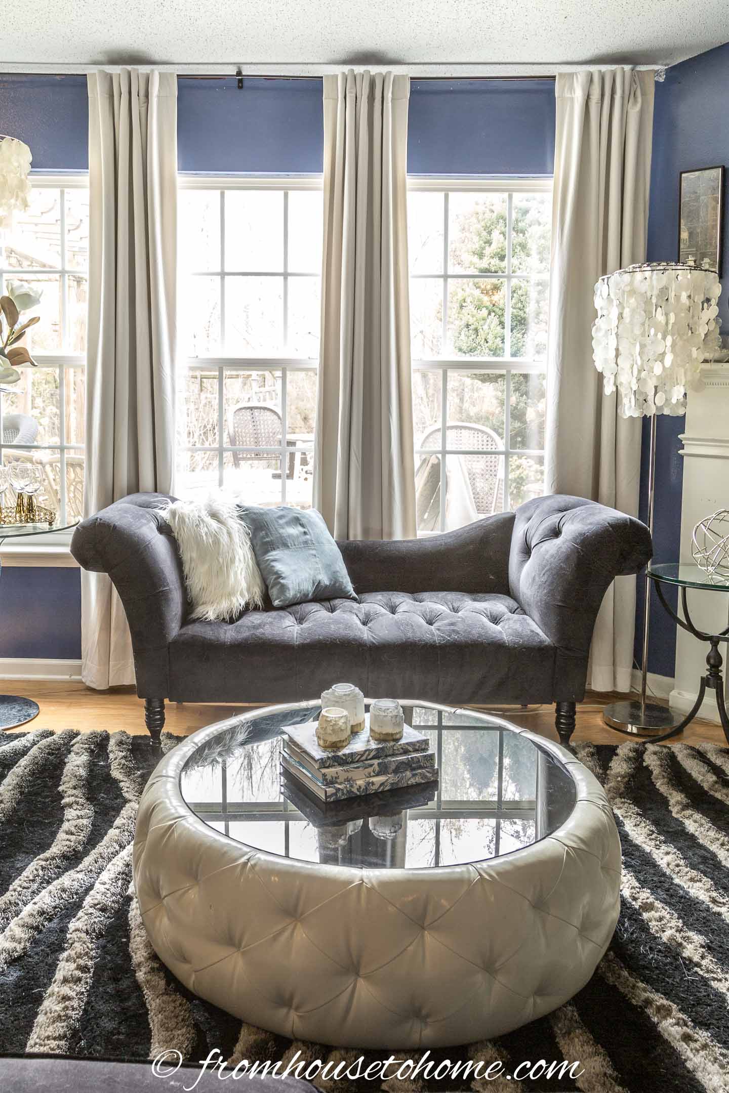 Living room painted in Farrow and Ball "Pitch Blue"