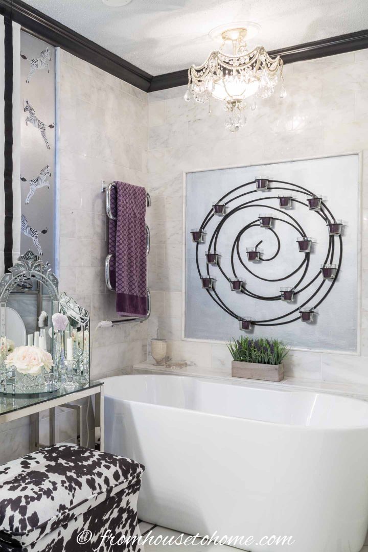 White and silver bathroom with gray ceiling
